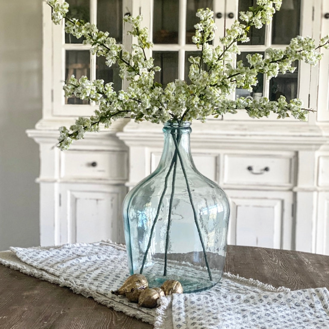 Cream Wild Blossom Spray 34&quot; tall, available as a set of 3 or set of 6, perfect for enhancing home decor and displayed beautifully in a Recycled Glass Vase.