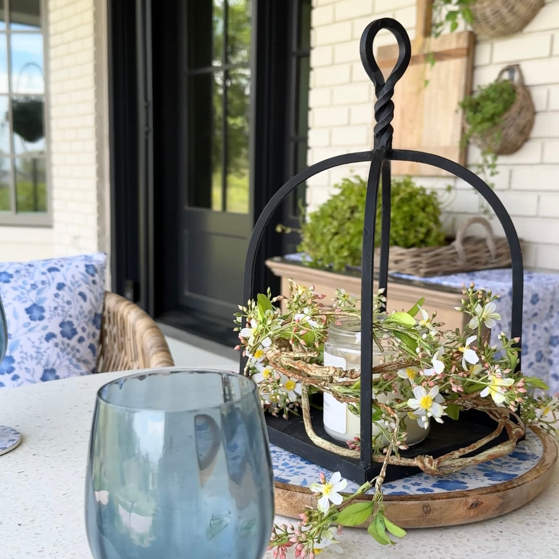 Styled 5ft Mini flower Garland draped over a rustic mantel with charming decor.