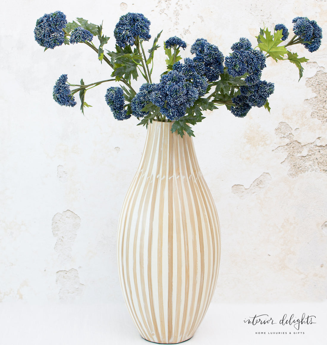 Stylish display of 21” Natural Striped Vase next to 17” Natural Striped Vase, highlighting their tall, slender shapes and artisan design.