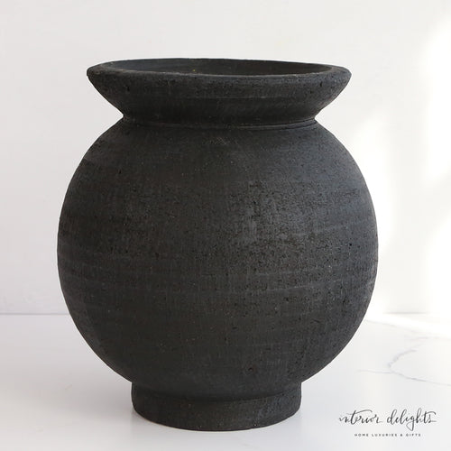 Close-up of the 9.5" Black Paul Vase, highlighting the high-quality ceramic and luxurious black finish.