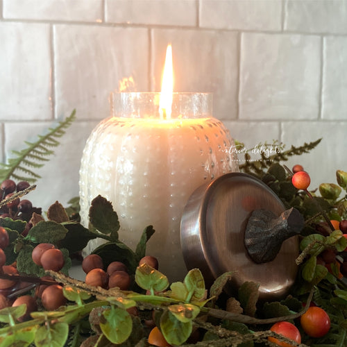 Pumpkin Spice Candle in Pumpkin Hobnail Jar with copper lid and pumpkin stem, perfect for cozy autumn decor.