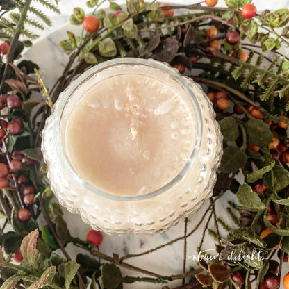 Pumpkin Spice Candle in Pumpkin Hobnail Jar, emphasizing its creamy pumpkin spice scent and decorative copper lid.