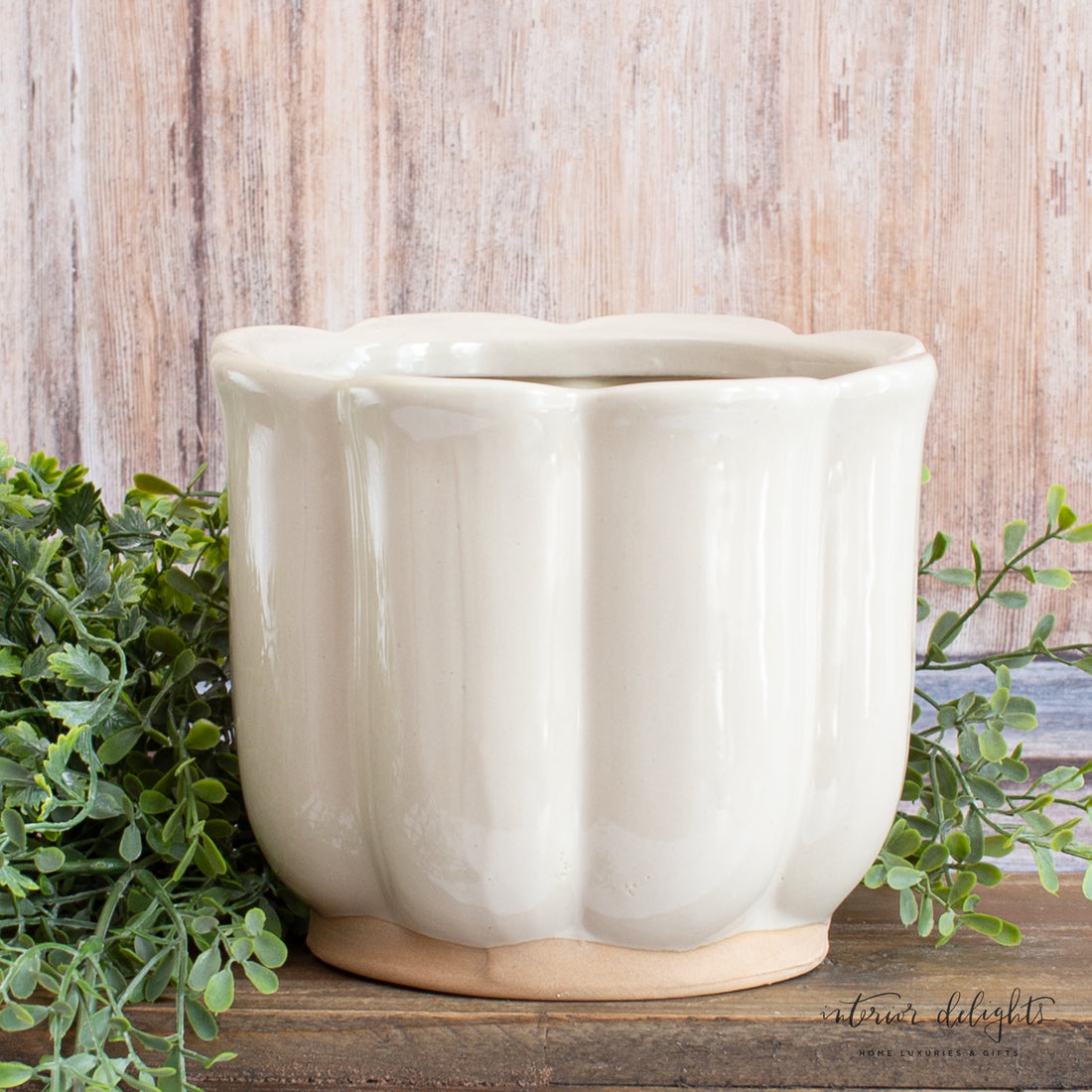 Set of 3 Beige Stoneware Planters in whimsical flower shape, perfect for small plants and succulents.