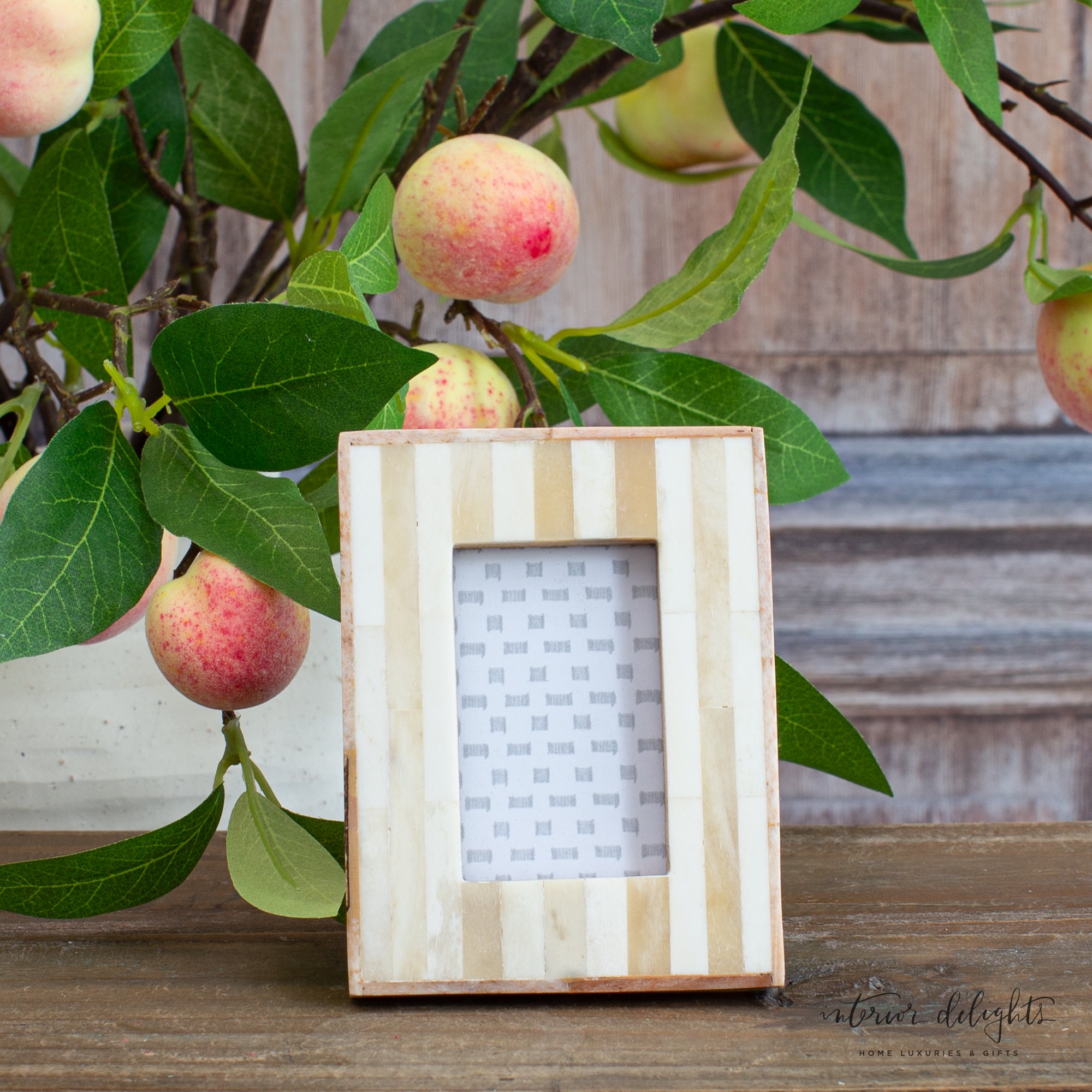 Elegant Striped Bone Inlay Photo Frame displayed against a modern decor background.