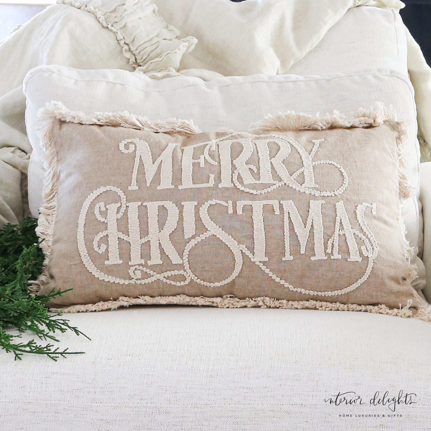 Beige Merry Christmas Pillow 12x20 showcasing festive design and cozy textures.