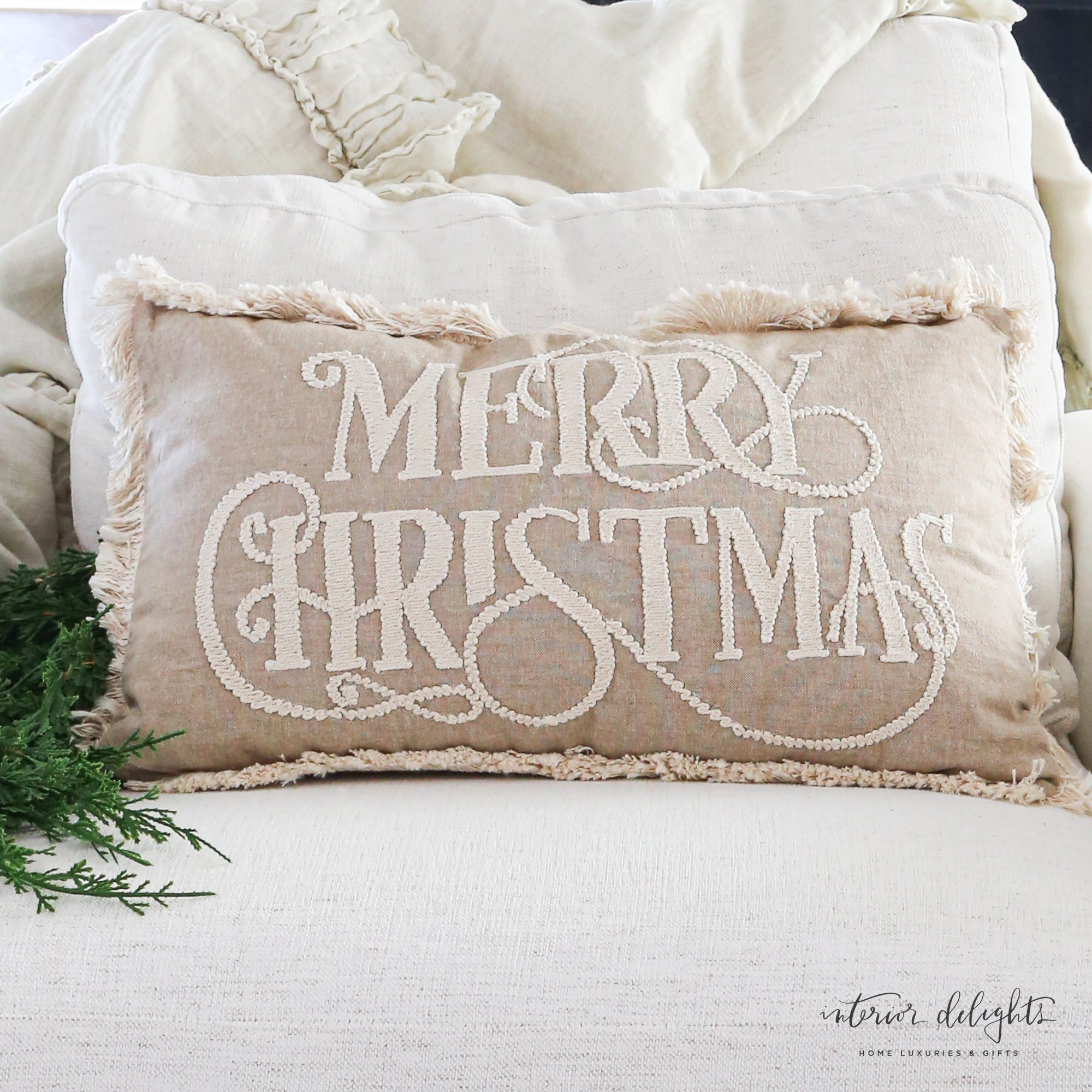 Beige Merry Christmas Pillow 12x20 showcasing festive design and cozy textures.