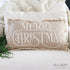 Beige Merry Christmas Pillow 12x20 showcasing festive design and cozy textures.