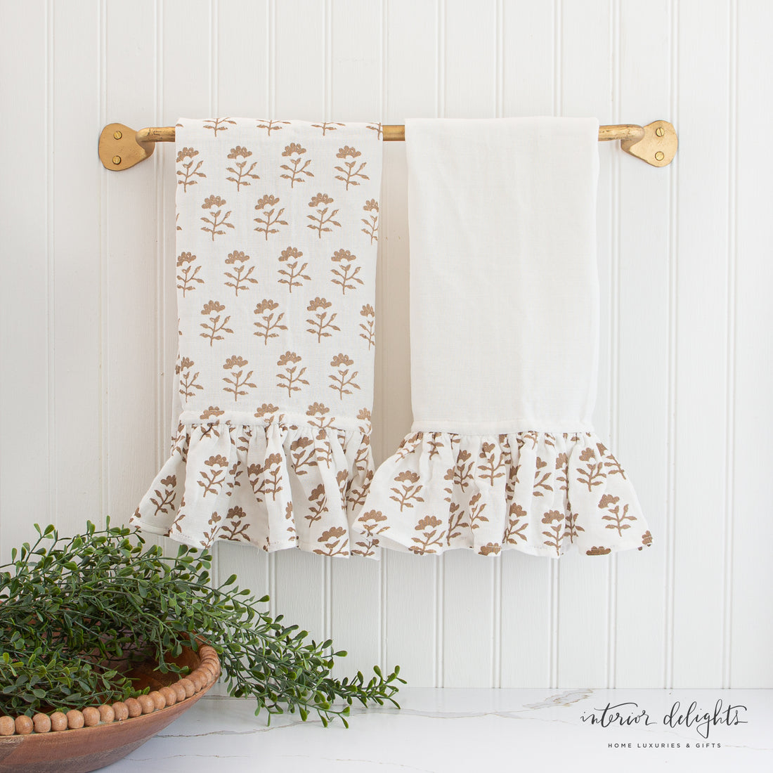 Molly Block Print Towel Set featuring delicate block print patterns and ruffle details on soft cotton fabric.