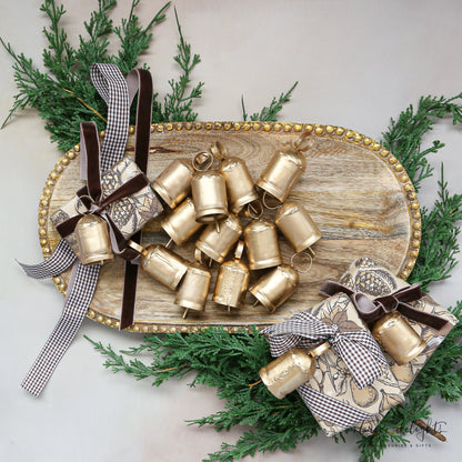Jingle Bell Filler set featuring 12 shiny bells in a festive holiday display.
