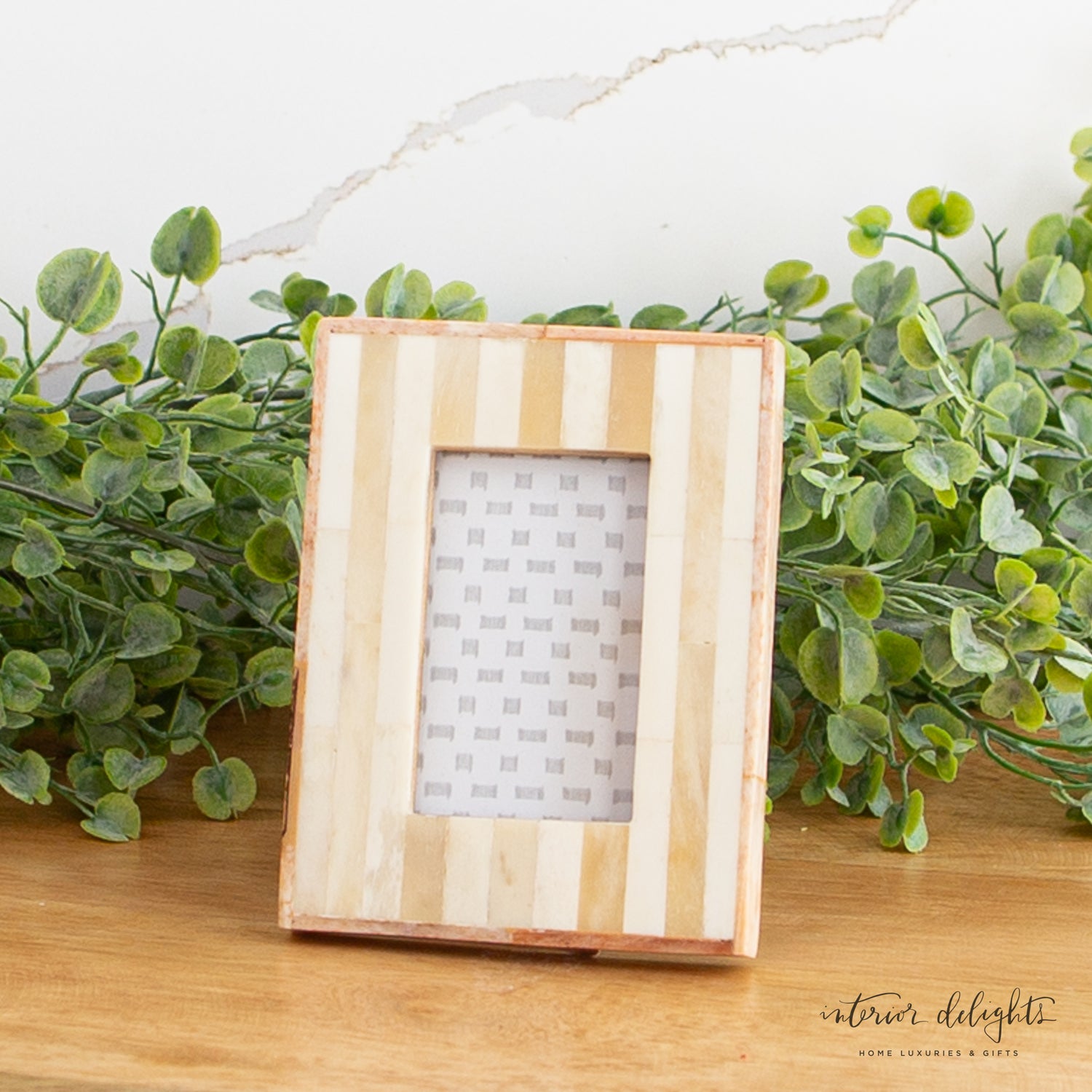 Handmade Striped Bone Inlay Photo Frame showcasing a 2&quot; x 3&quot; picture in a stylish design.