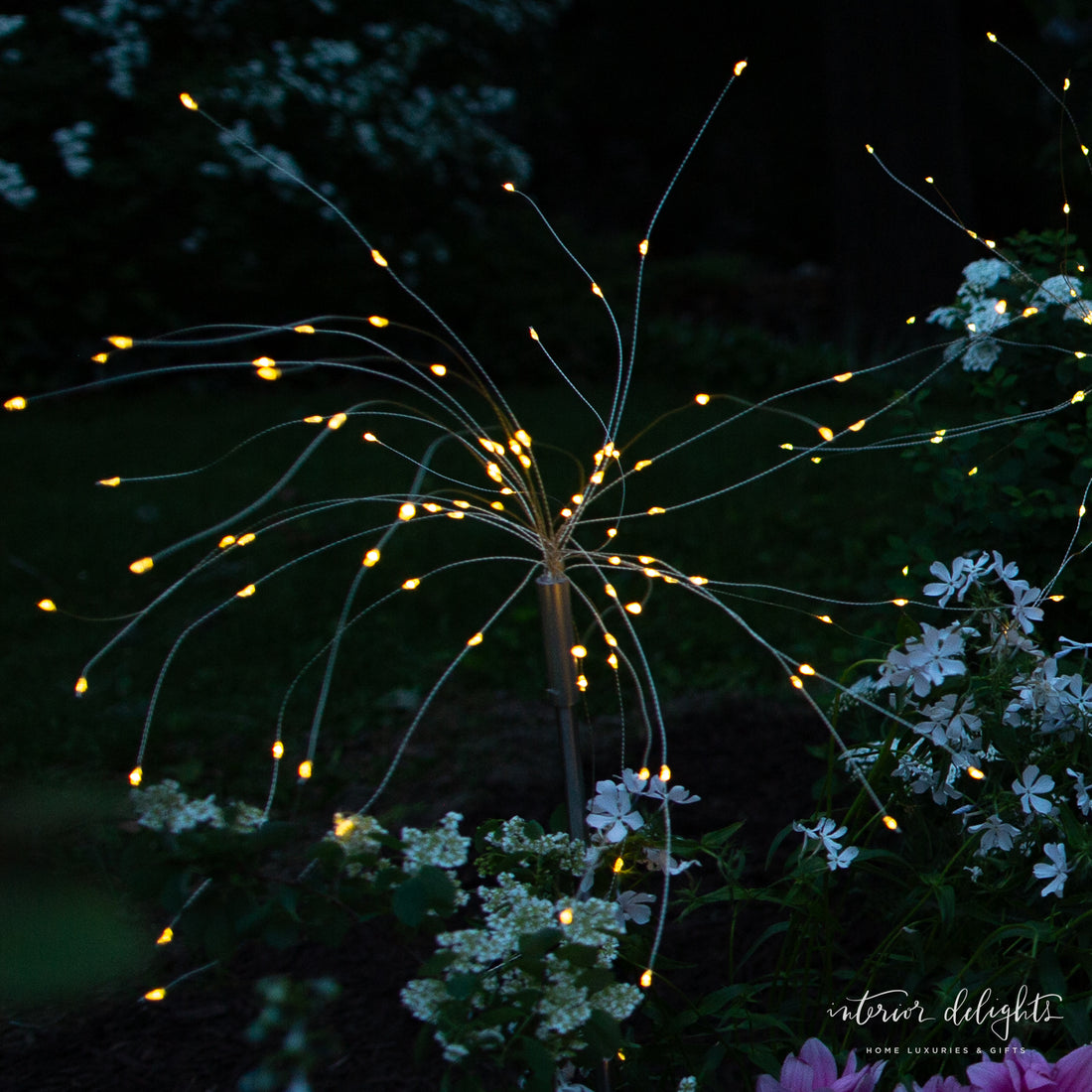 Close-up of Dandelion Solar Stake Light showing warm white glow effects, perfect for enhancing outdoor spaces.