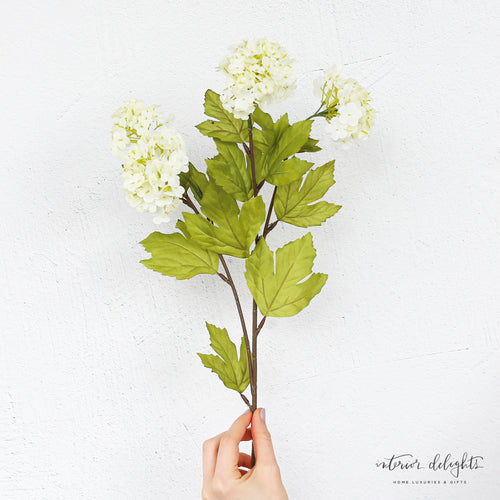 27" Snowball Spray arrangement perfect for spring decoration, featuring a flexible stem for easy vase placement.