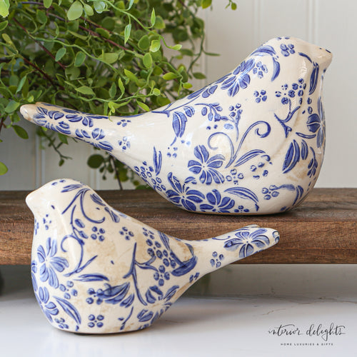 Ceramic Blue Floral Birds - Set of 2, showcasing delicate blue floral designs on cream-glazed ceramic, perfect for home decor.