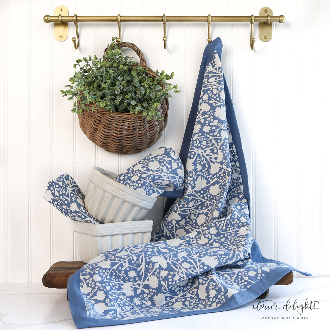 Meadows Bleu Floral Tea Towels - Set of 3 featuring blue and white floral designs, perfect for dining and picnics.