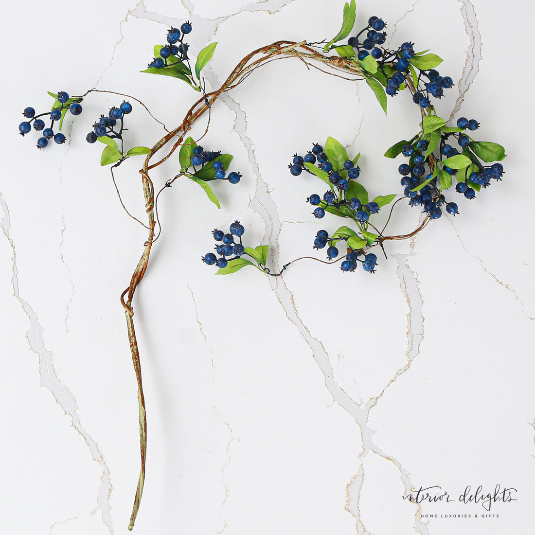 Flexible Blue Berry Hanging Vine suitable for vases and centerpieces, adding a vibrant seasonal touch.