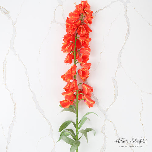 Vibrant 44" Orange Persian Lily faux flower stem showcasing intricate details, perfect for bold floral arrangements.