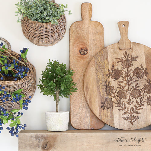 Stylish Long Board with Engraved Edge, designed for serving guests, with a beautiful elongated shape and smooth wood texture.