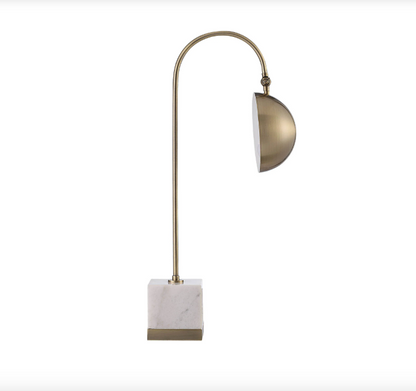 Folding Brass and Marble Table Lamp displayed in a cozy home setting, showcasing its dimensions and warm lighting.