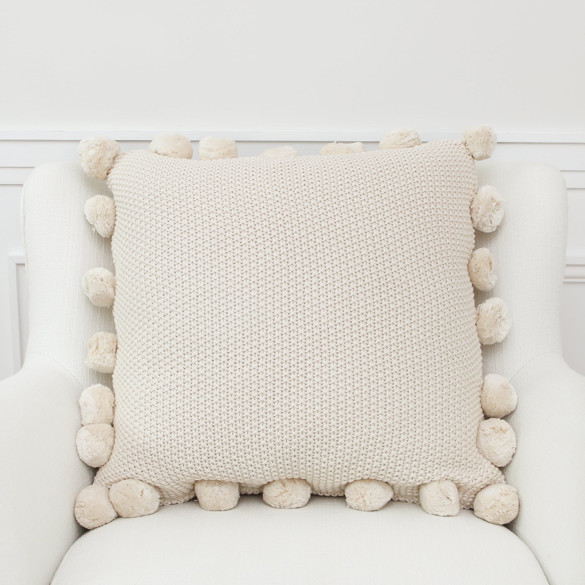 Cream Knit Pillow with Pompom Trim
