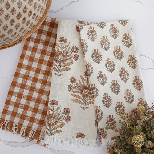 Autumn Block Print Tea Towels set of 3 featuring unique orange gingham, large floral, and small floral patterns, perfect for adding charm to your seasonal kitchen decor.