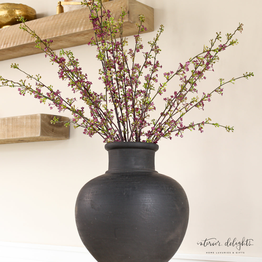 Elegant 13.5 in Black Terracotta Vase highlighting its narrow opening, perfect for stunning floral displays.