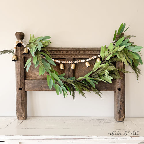 6ft Cedar Eucalyptus Garland-Single elegantly displayed over a mantel, showcasing its lightweight and airy design.