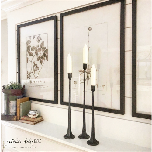 Set of 3 Cast Iron Candle Holders in various heights, perfect for adding elegance to any décor.