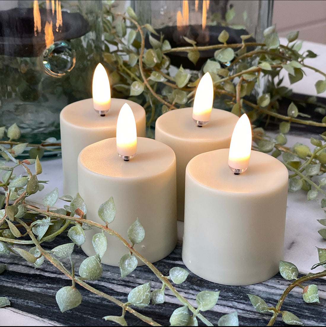 Rechargeable Flameless Votive Candle Set of 4, showcasing elegant design perfect for home decor.